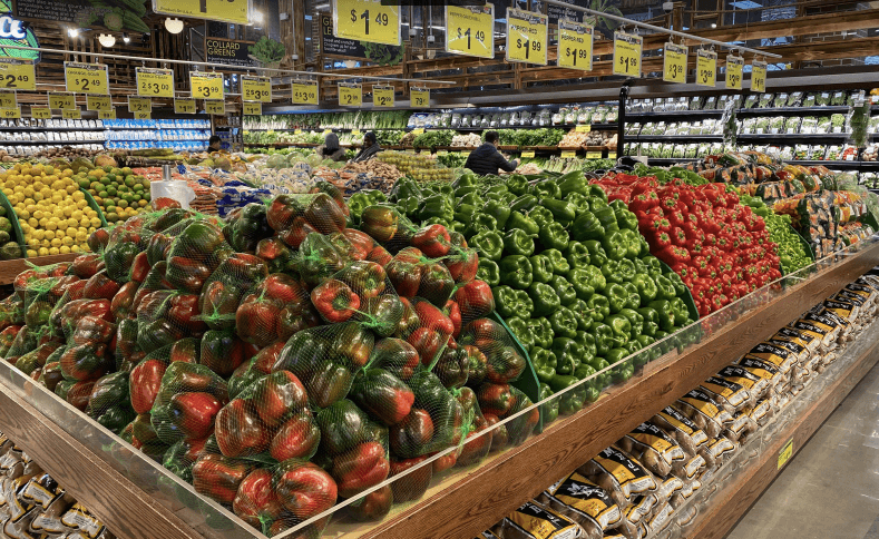 piles of fruits and vegetables at the Food Bazaar in Red Hook, a great option to shop for groceries if you're staying in a Carroll Gardens apartment rental