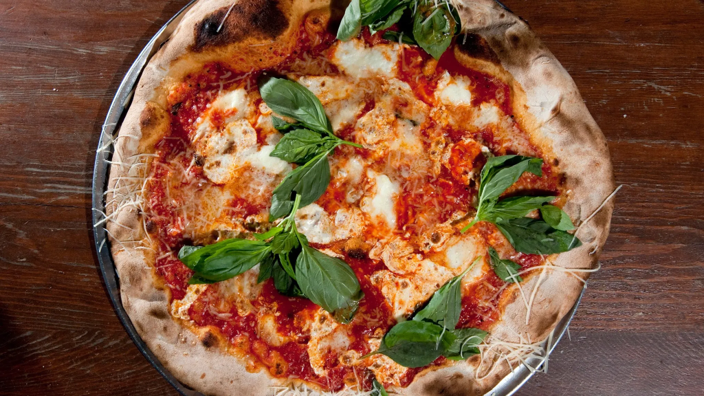 a margherita pizza from Lucali, a great option for vegetarian-friendly fare in Carroll Gardens